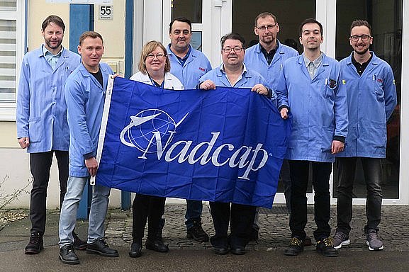  Eight people in securing Nadcap accreditation.