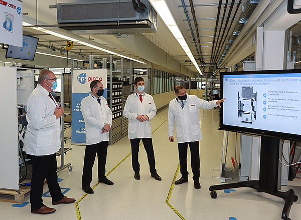 (from left to right): Franz Löffler (District President of the Upper Palatinate and District Administrator of Cham), Hubert Aiwanger (Bavarian Minister of Economic Affairs), Martin Eisenhart (SVP Business Development of Zollner Elektronik AG), Zeyad Abul-Ella (Managing Director of HPS Home Power Solutions GmbH).